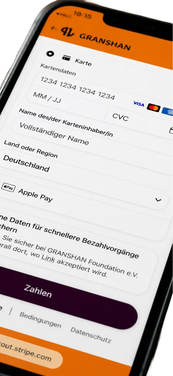 The GRANSHAN Stripe checkout on a phone: card details, country and Apple Pay